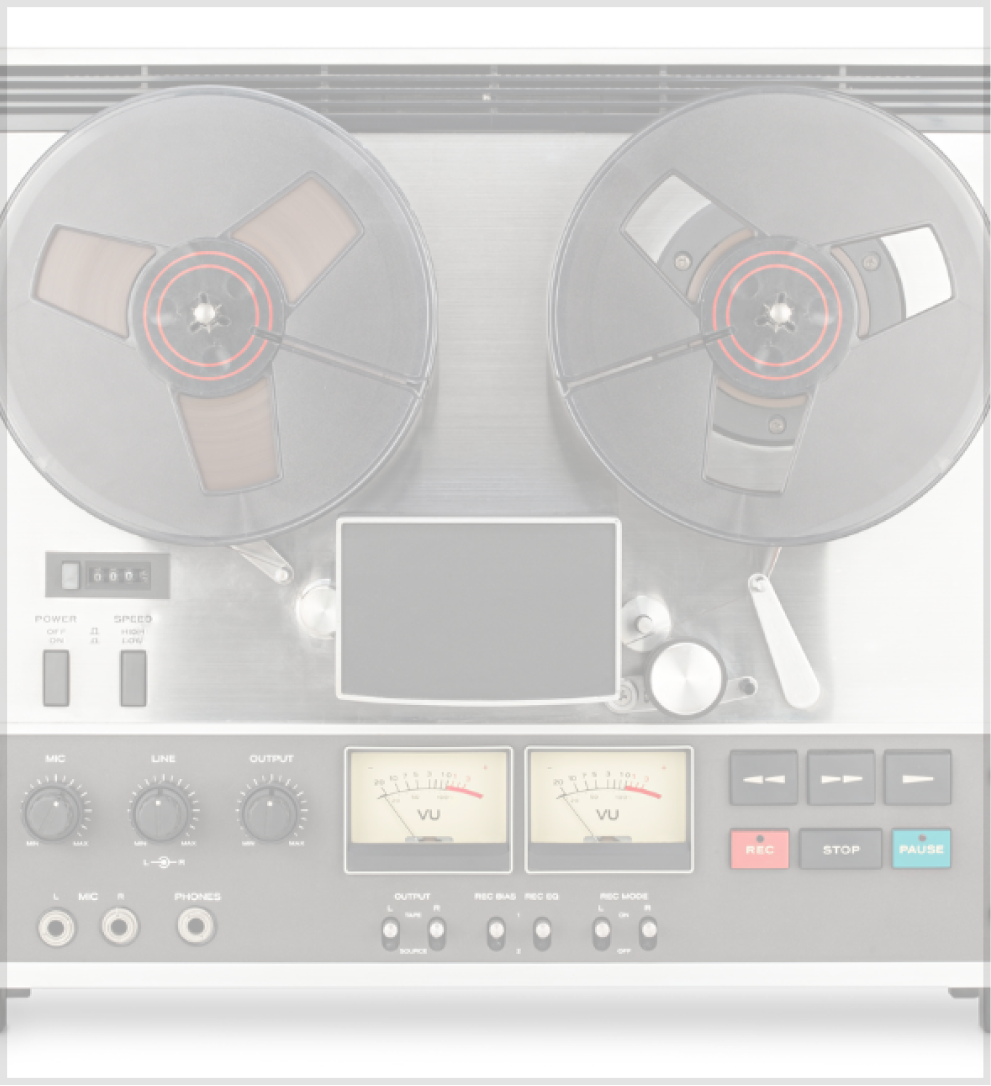 Vintage tape recorder with dual reels and controls.